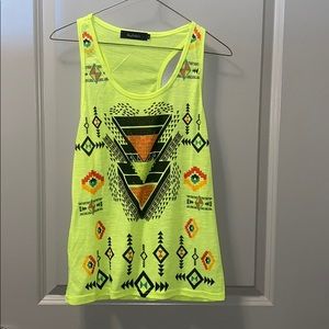 Magnolia’s neon yellow Aztec design tank size L